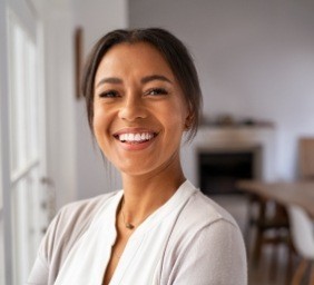 Smiling woman in white blouse