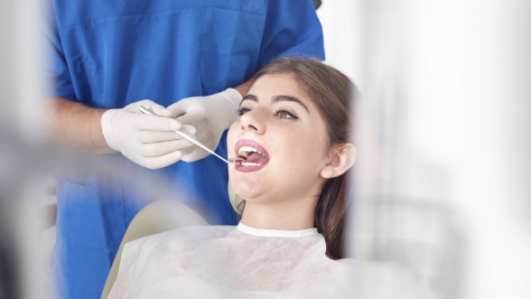 Woman receiving a preventive dentistry checkup