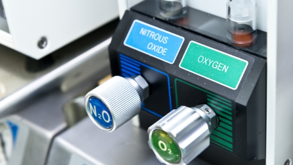 Buttons on sedation dentistry machine that say nitrous oxide and oxygen